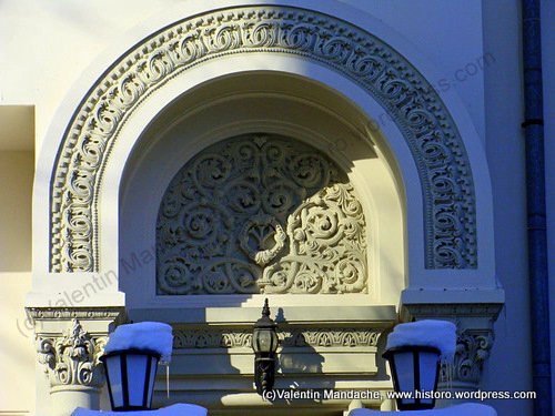 Neo-Romanian style doorway pediment