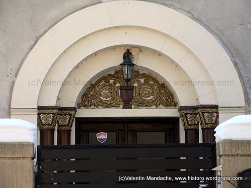 Neo-Romanian style doorway pediment