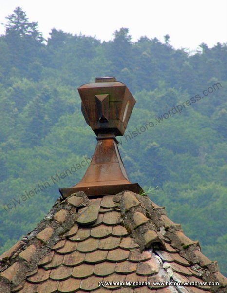 Neo-Romanian roof finials shaped as steam train smoke stack, Sinaia train station