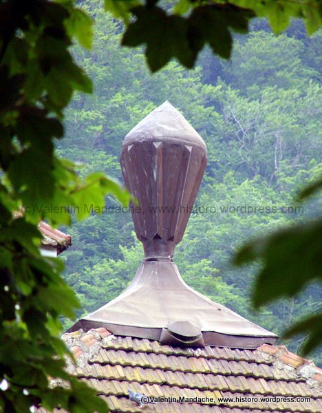 Neo-Romanian roof finial shaped as steam train smoke stack, Sinaia train station