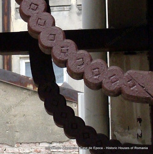 Neo-Romanian doorway awning