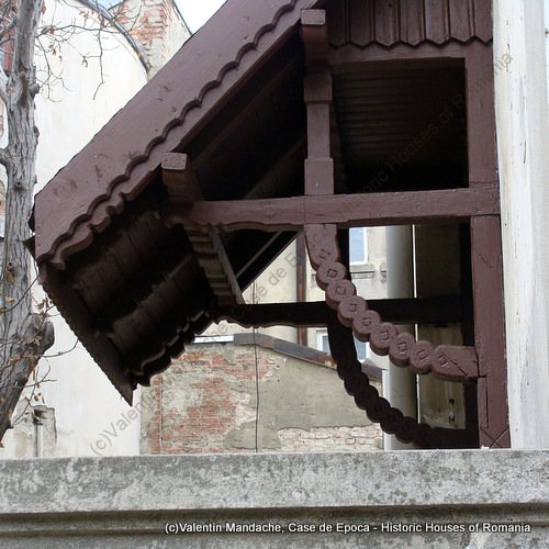Neo-Romanian doorway awning